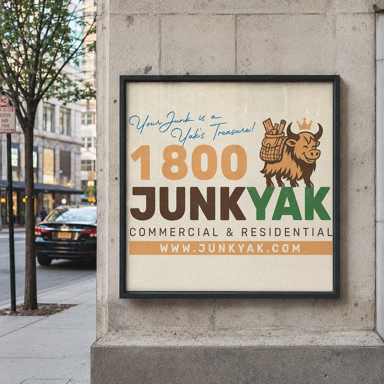 Street poster designed for 1800 JunkYak junk removal, framed on a city wall