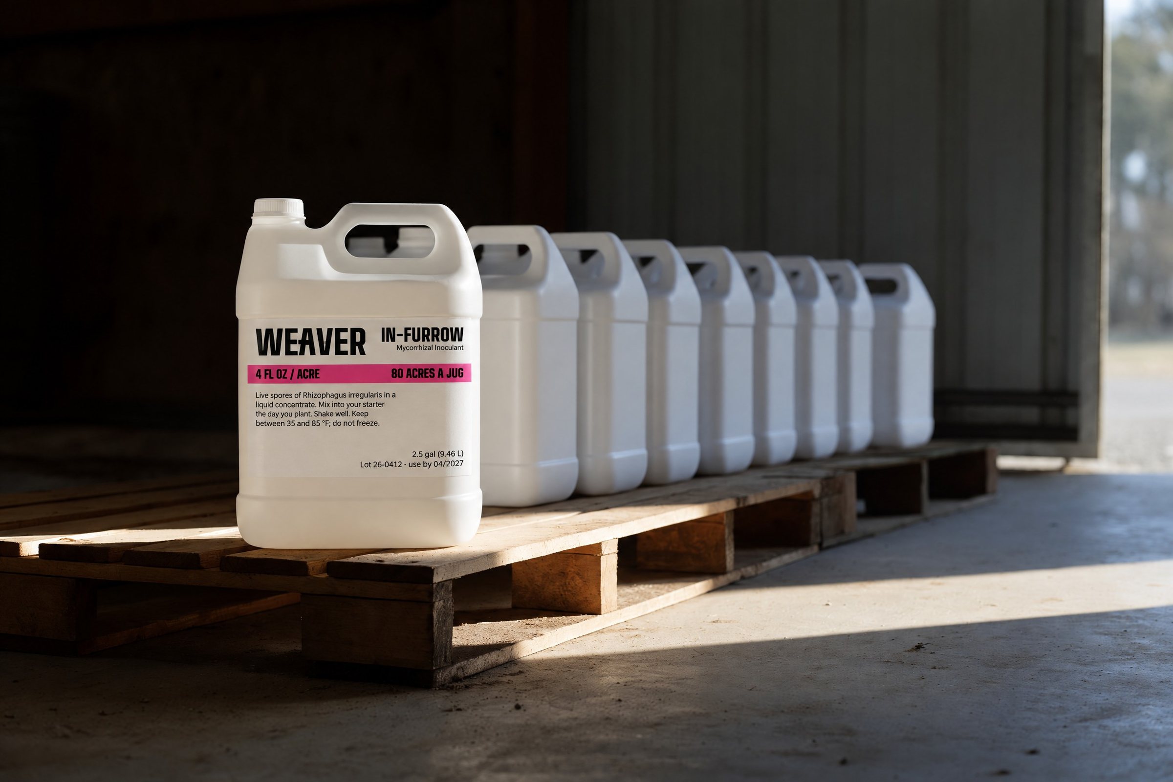 A pallet of Weaver jugs in a machine shed